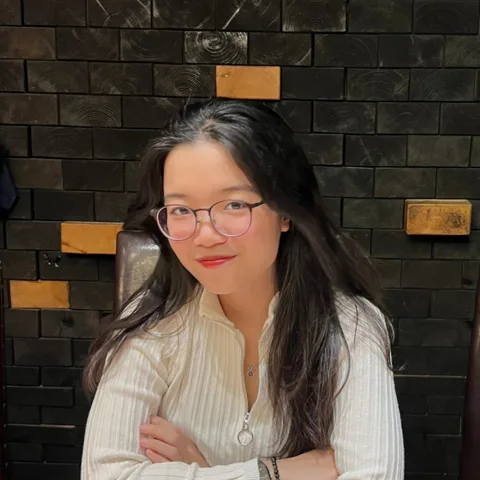 Linh Phan smiling outdoors